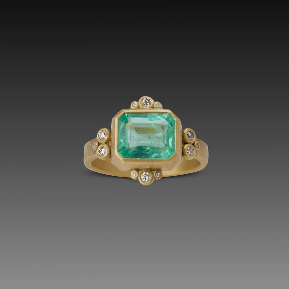Emerald Ring With Diamond Trios
