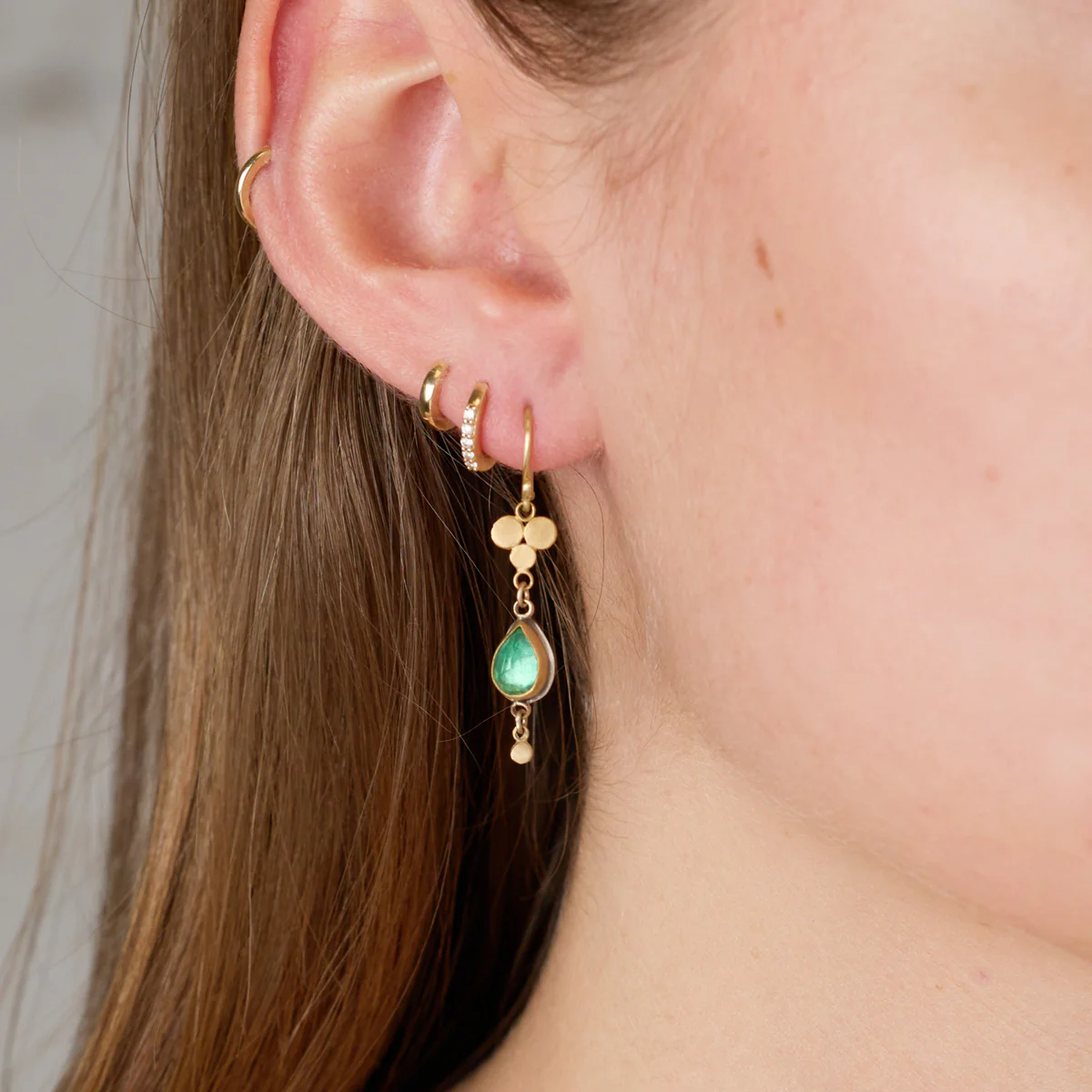 Emerald Teardrop Earrings with Gold Trios - Image 2