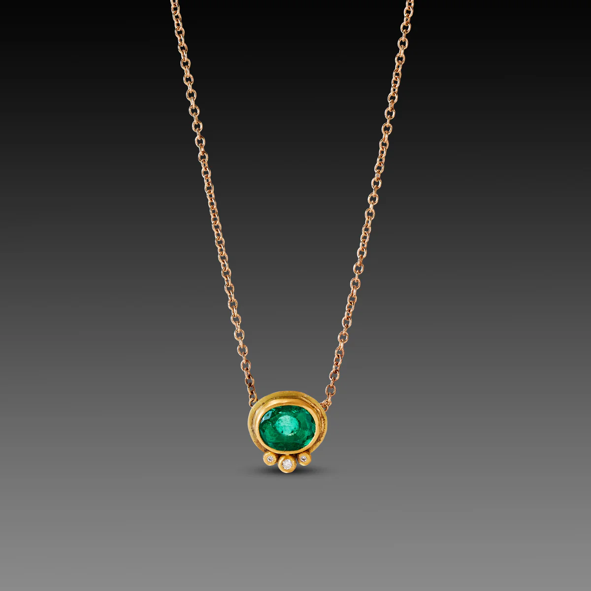 Oval Emerald Necklace with Diamond Trio