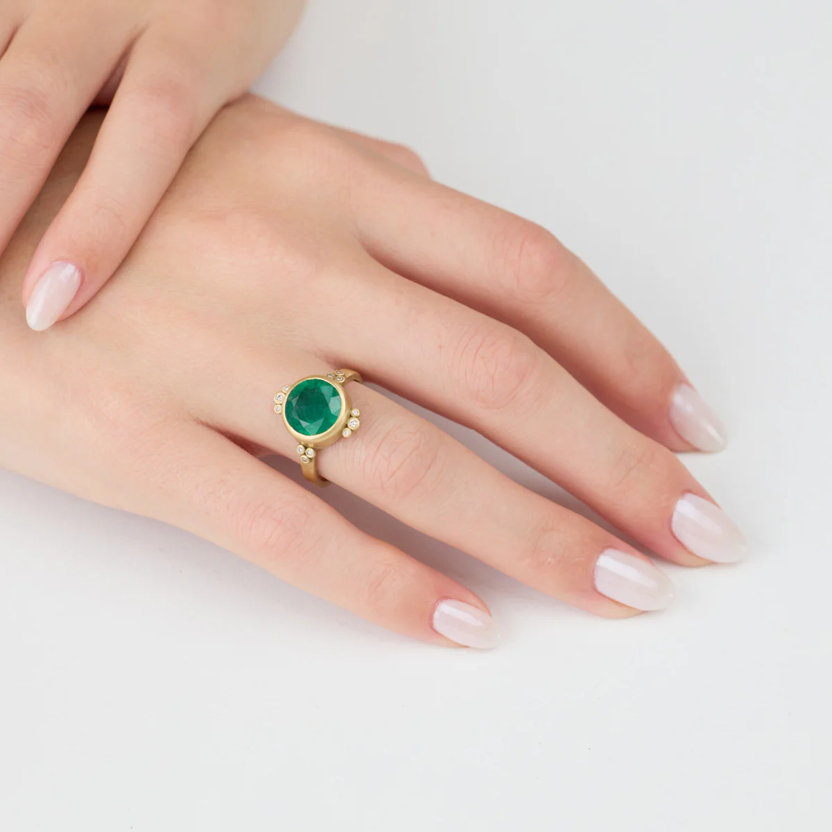 Round Emerald Ring With Diamond Trios - Image 2