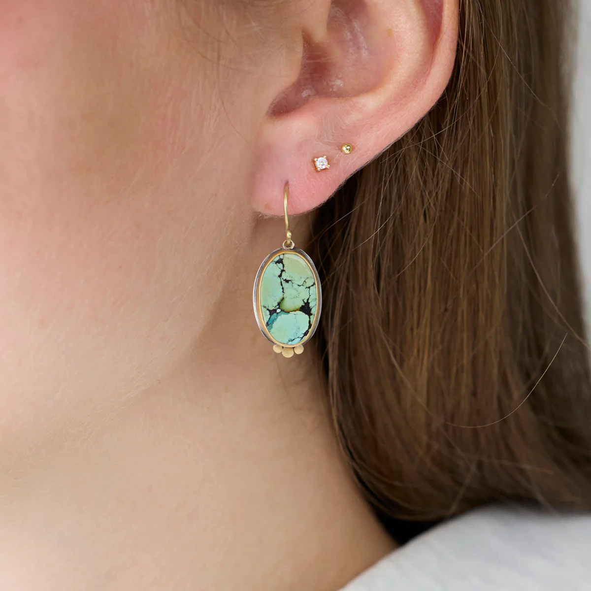 Oval Turquoise Earrings with 22k Gold Trios - Image 2