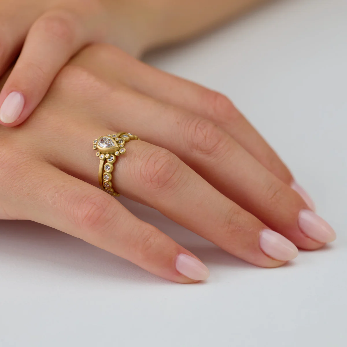 Pear Diamond Ring with Diamond Trios - Image 3