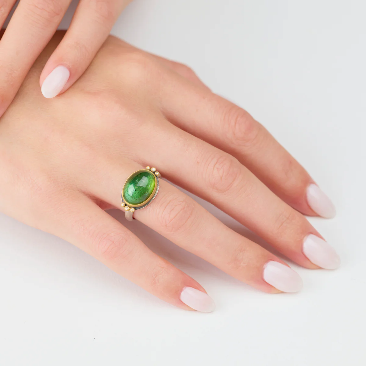Smooth Green Tourmaline Ring with Diamond Trios - Image 2