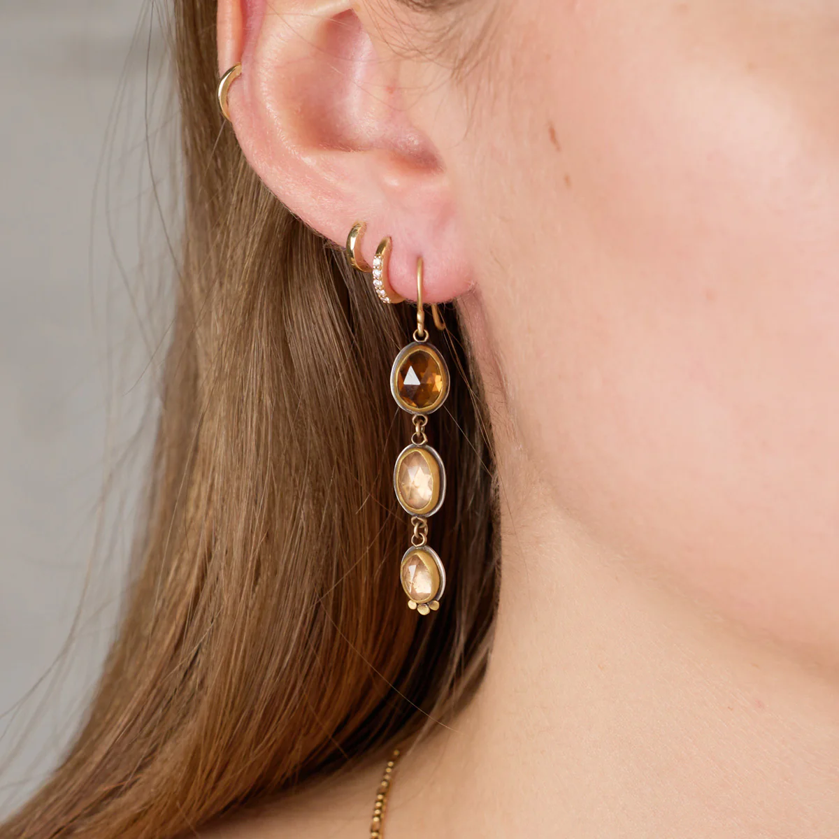 Triple Zircon Drop Earrings - Image 2